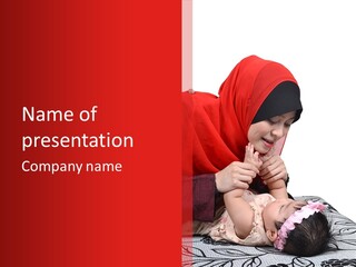 A Woman In A Red Hijab Is Playing With A Baby PowerPoint Template
