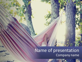 A Person Laying In A Hammock In A Park PowerPoint Template
