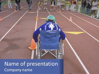 A Person In A Wheel Chair On A Race Track PowerPoint Template
