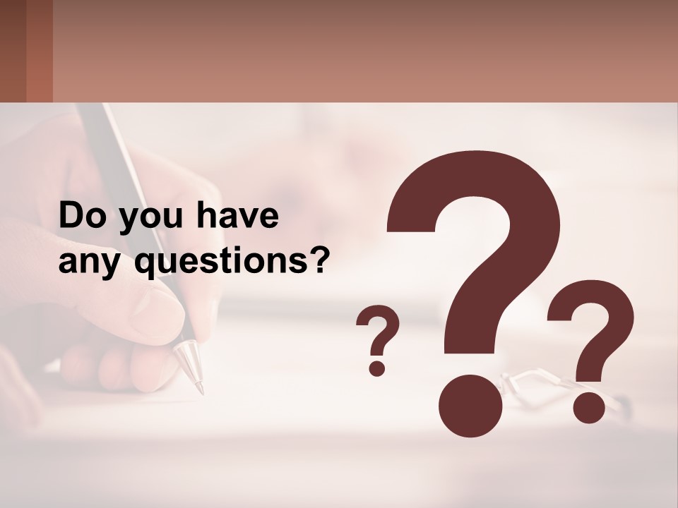 A Person Writing On A Piece Of Paper With A Pen PowerPoint Template