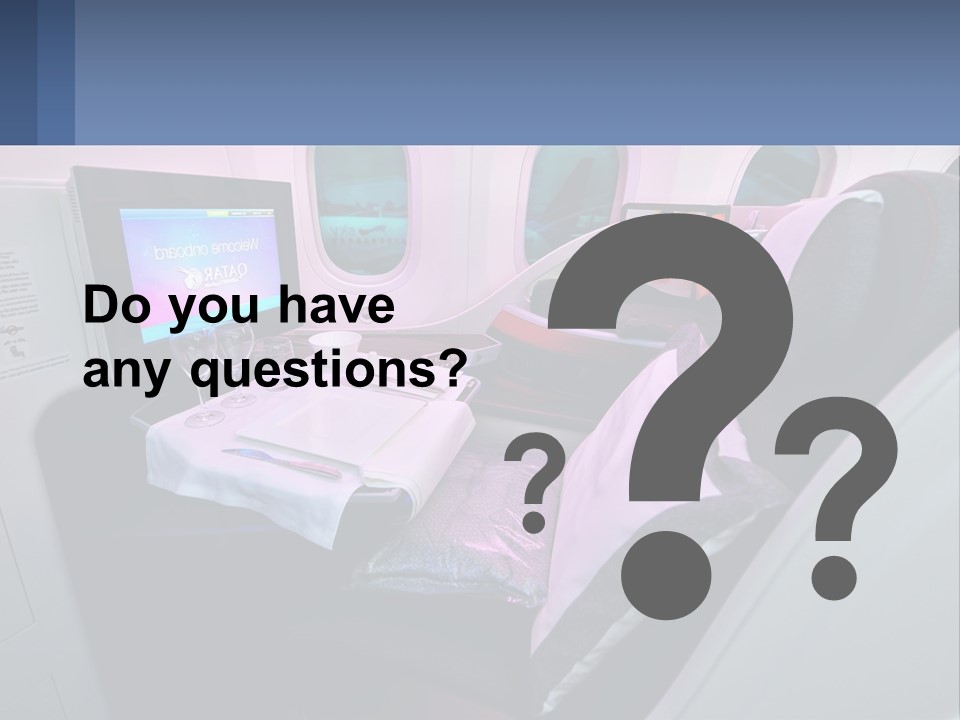 An Airplane Seat With A Table And Wine Glasses On It PowerPoint Template