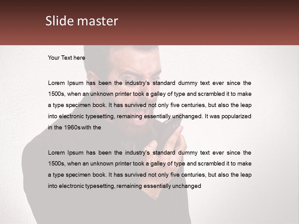 A Man Holding A Cell Phone In His Hand PowerPoint Template