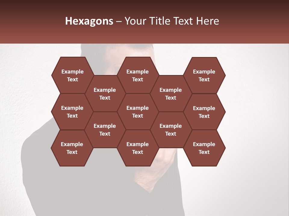 A Man Holding A Cell Phone In His Hand PowerPoint Template