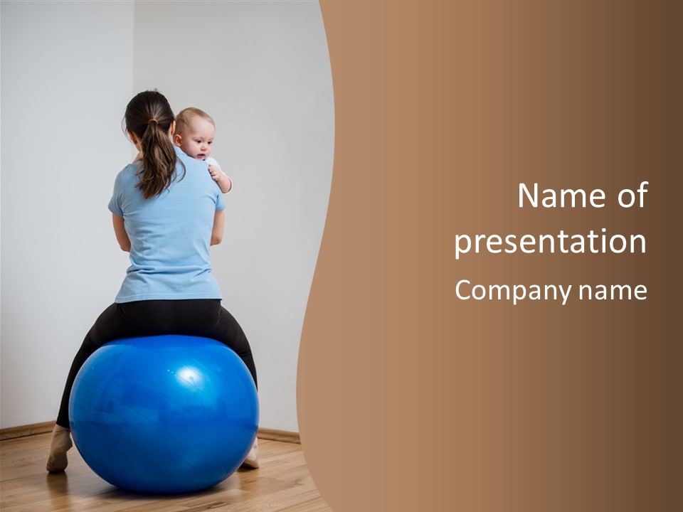 A Woman Sitting On Top Of A Blue Ball While Holding A Baby PowerPoint Template