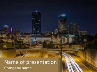 A City At Night With Light Streaks On The Road PowerPoint Template