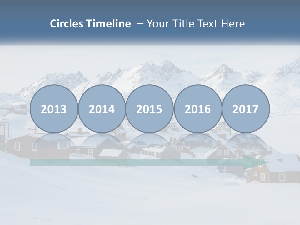 A Snowy Town With Mountains In The Background PowerPoint Template