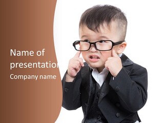 A Little Boy Wearing Glasses And A Suit PowerPoint Template