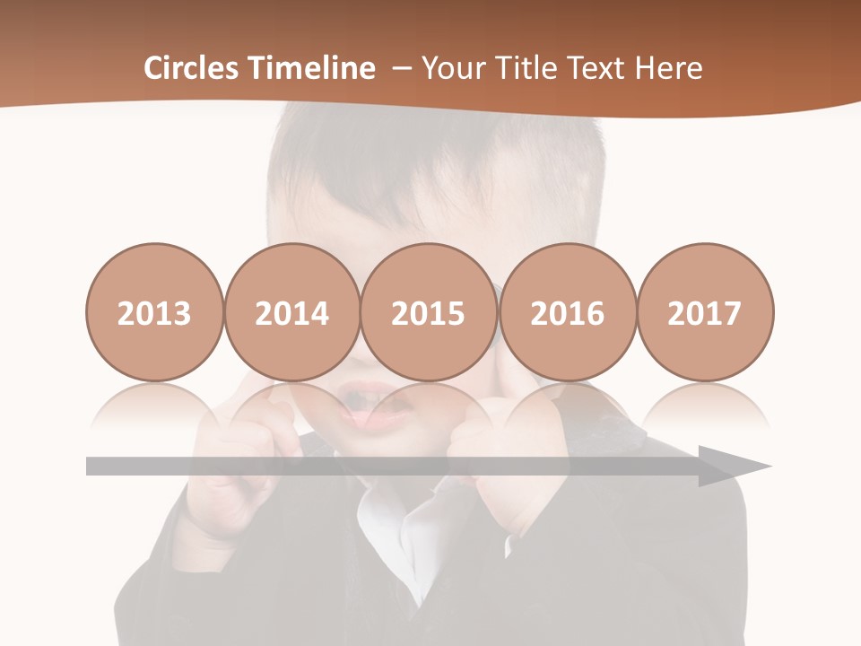 A Little Boy Wearing Glasses And A Suit PowerPoint Template
