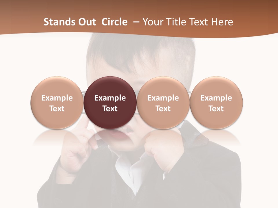 A Little Boy Wearing Glasses And A Suit PowerPoint Template