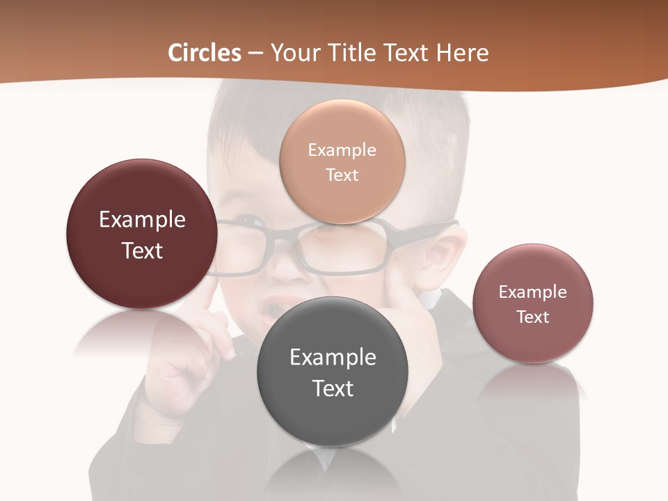 A Little Boy Wearing Glasses And A Suit PowerPoint Template