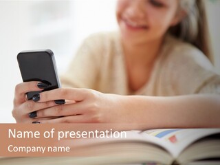 A Woman Sitting At A Table Using A Cell Phone PowerPoint Template