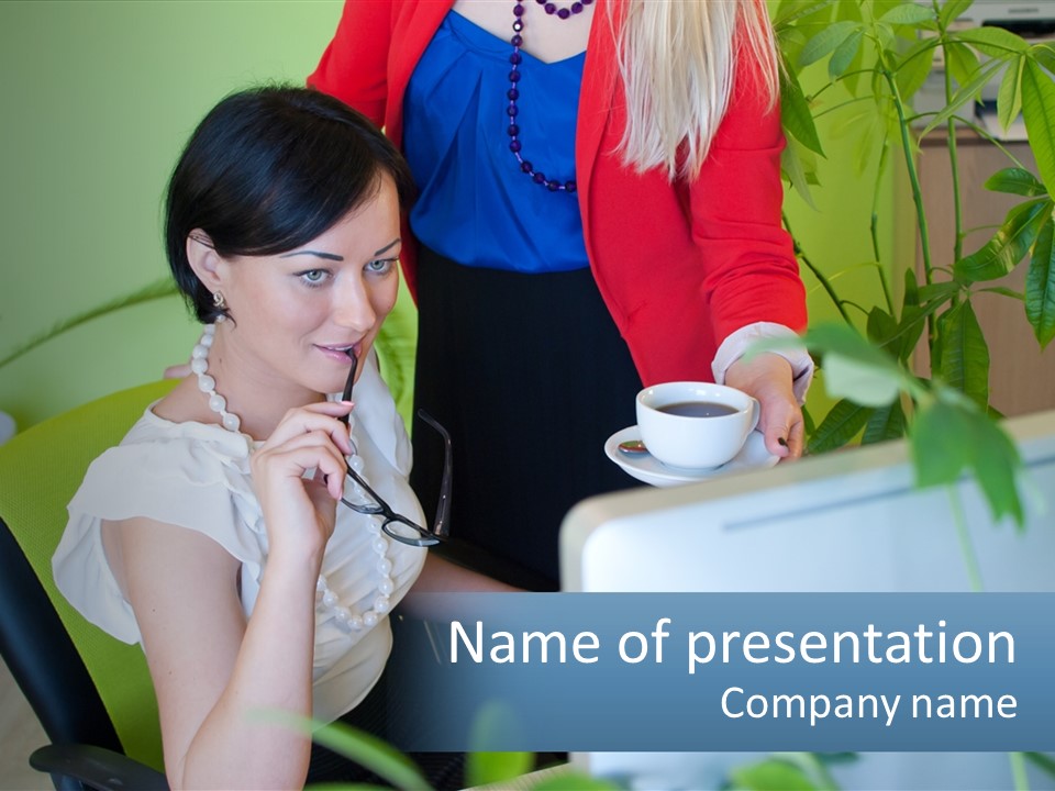 Two Women Are Looking At A Computer Screen PowerPoint Template