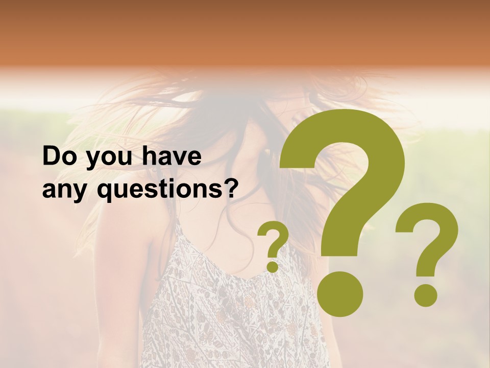 A Woman With Her Hair Blowing In The Wind PowerPoint Template