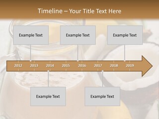 A Banana And A Glass Of Milk On A Table PowerPoint Template
