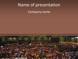A Large Group Of People In A Large Auditorium PowerPoint Template