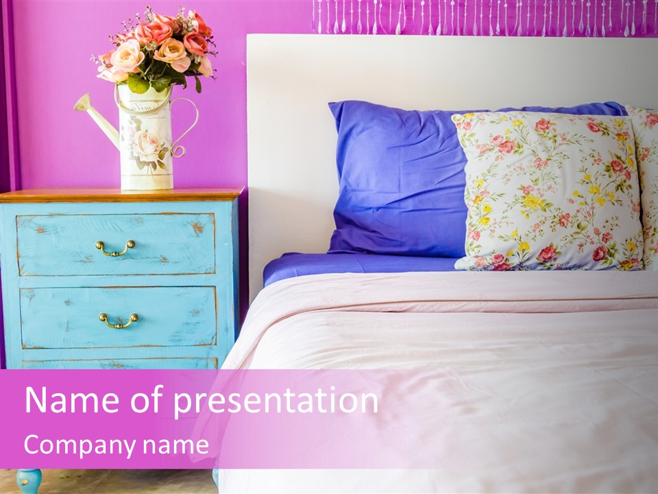 A Bed With Pillows And A Vase Of Flowers On Top Of It PowerPoint Template