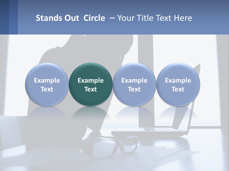 A Woman Sitting In Front Of A Laptop Computer PowerPoint Template