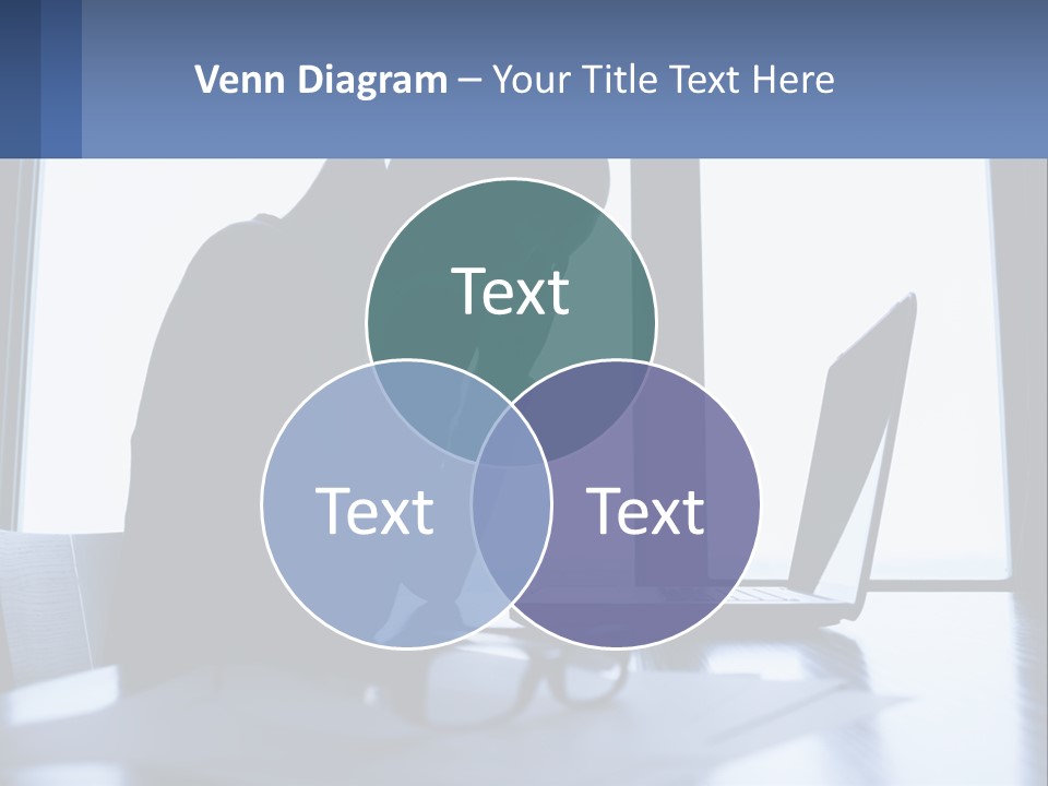 A Woman Sitting In Front Of A Laptop Computer PowerPoint Template