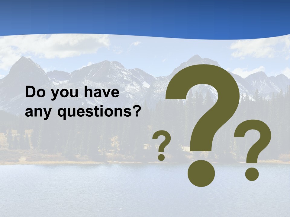 A Lake Surrounded By Trees And Mountains In The Background PowerPoint Template