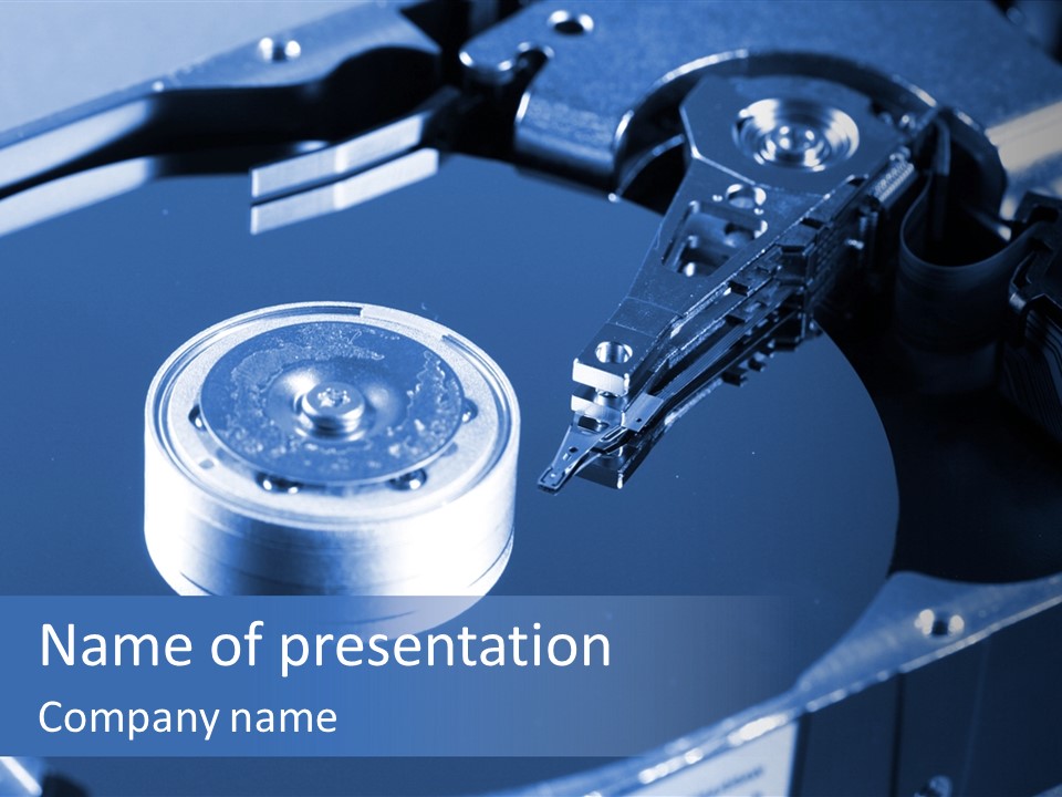 A Hard Drive With A Key On Top Of It PowerPoint Template