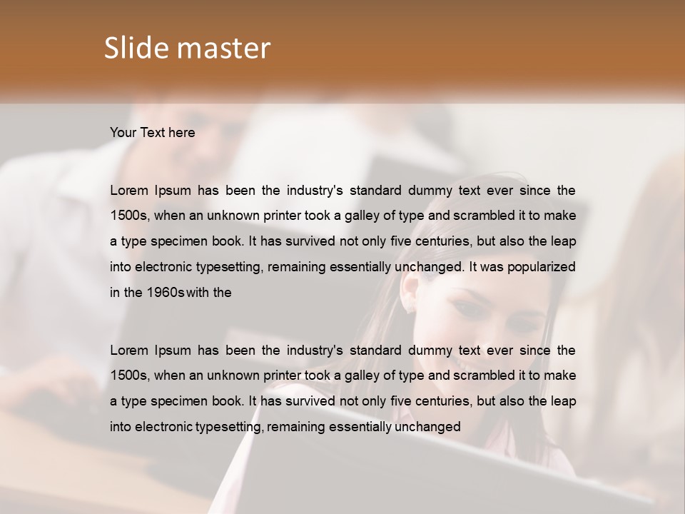 A Group Of People Working On Computers In An Office PowerPoint Template