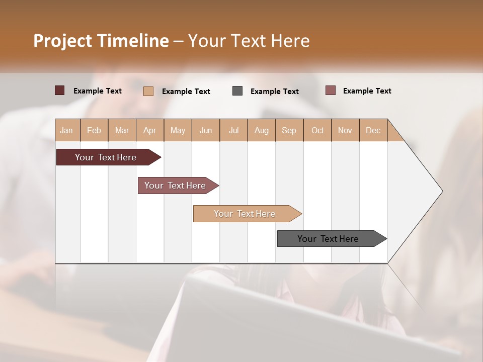 A Group Of People Working On Computers In An Office PowerPoint Template