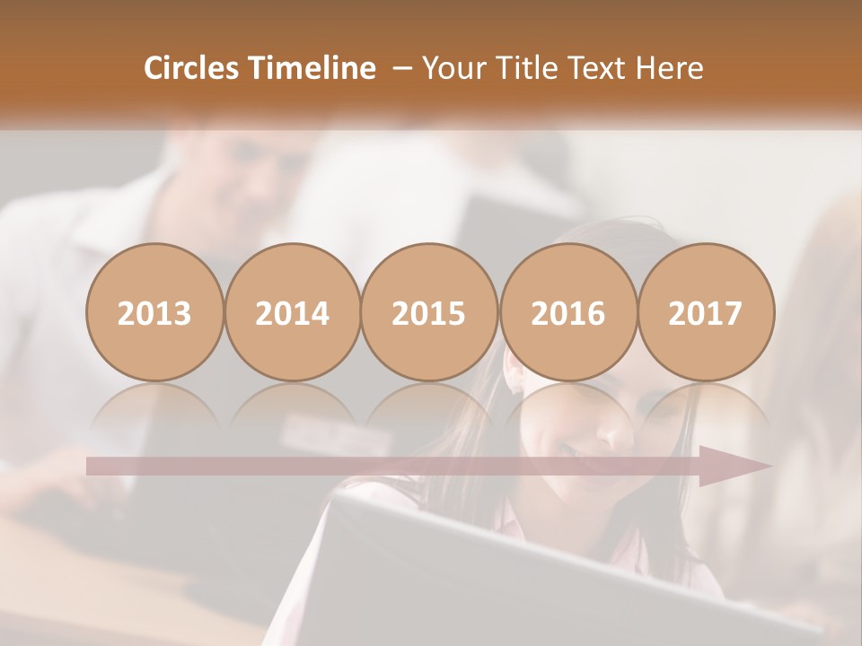 A Group Of People Working On Computers In An Office PowerPoint Template