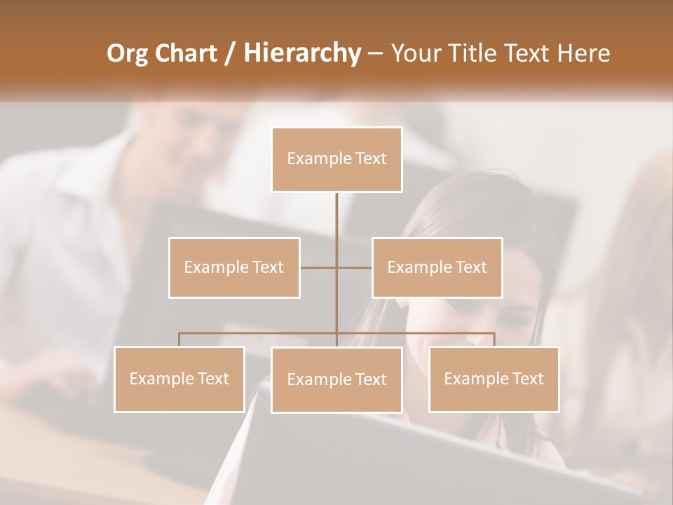 A Group Of People Working On Computers In An Office PowerPoint Template