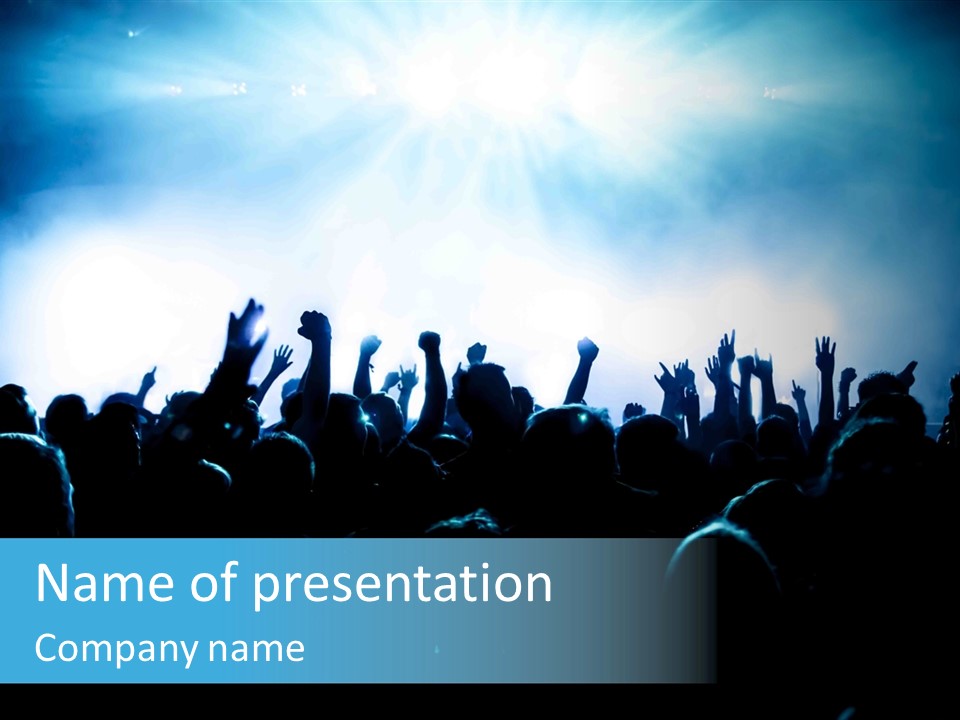A Crowd Of People At A Concert With Their Hands In The Air PowerPoint Template