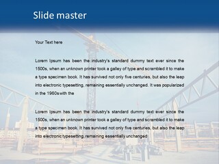 A Crane That Is On Top Of A Building PowerPoint Template