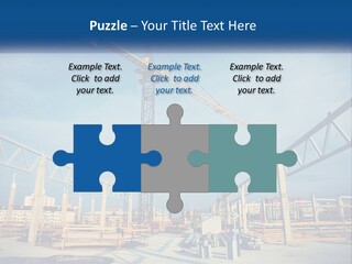 A Crane That Is On Top Of A Building PowerPoint Template