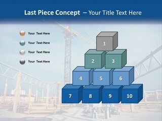 A Crane That Is On Top Of A Building PowerPoint Template