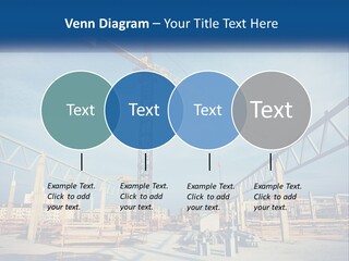 A Crane That Is On Top Of A Building PowerPoint Template