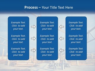 A Crane That Is On Top Of A Building PowerPoint Template