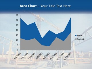A Crane That Is On Top Of A Building PowerPoint Template