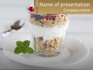 A Glass Of Yogurt And A Spoon On A Plate PowerPoint Template