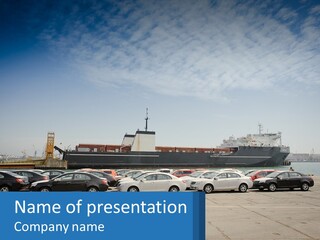 A Large Boat Is In The Water Next To Many Cars PowerPoint Template