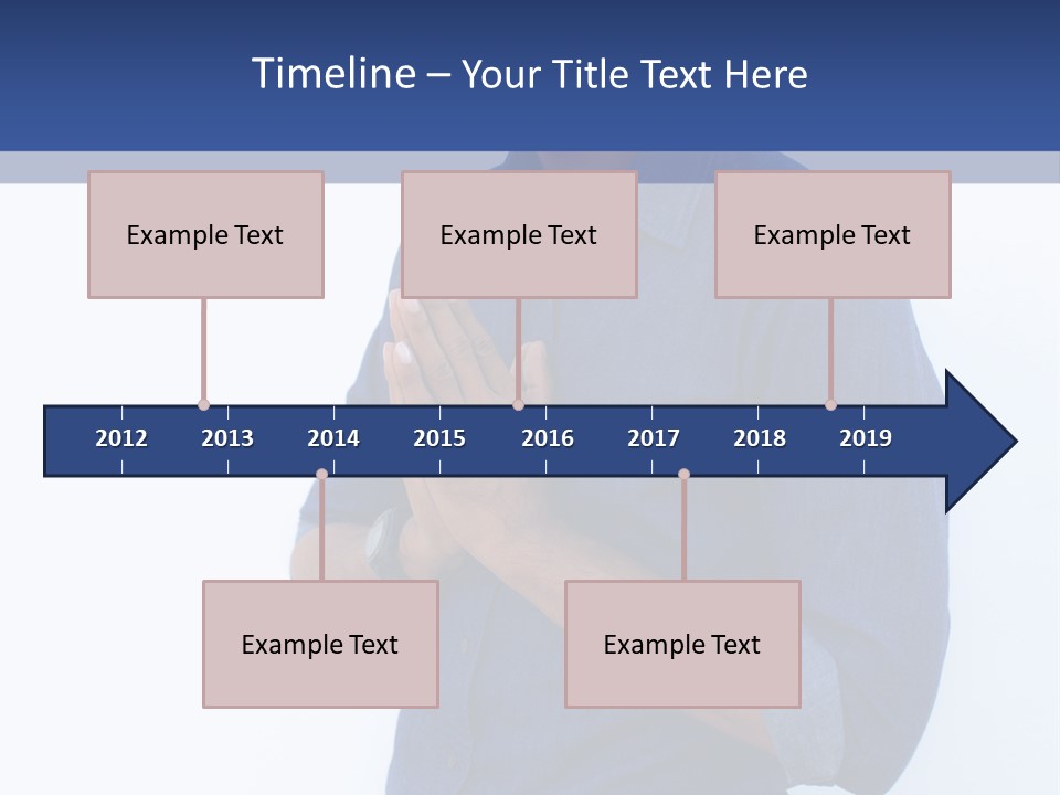 A Man Standing In Front Of A Wall With His Hands Together PowerPoint Template