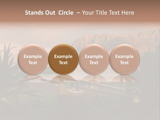 A Boat Is Docked On A Lake With Mountains In The Background PowerPoint Template