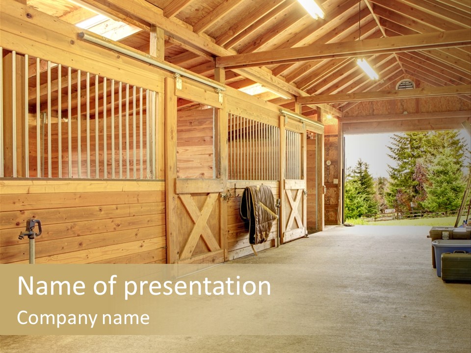 A Horse Barn With A Horse Inside Of It PowerPoint Template