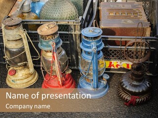 A Group Of Old Fashioned Lamps Sitting On Top Of A Table PowerPoint Template