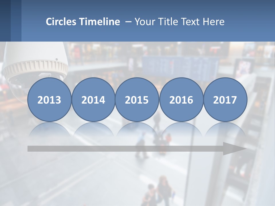 A Security Camera Hanging From The Ceiling Of A Building PowerPoint Template