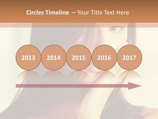 A Woman With Long Hair Is Looking At The Camera PowerPoint Template