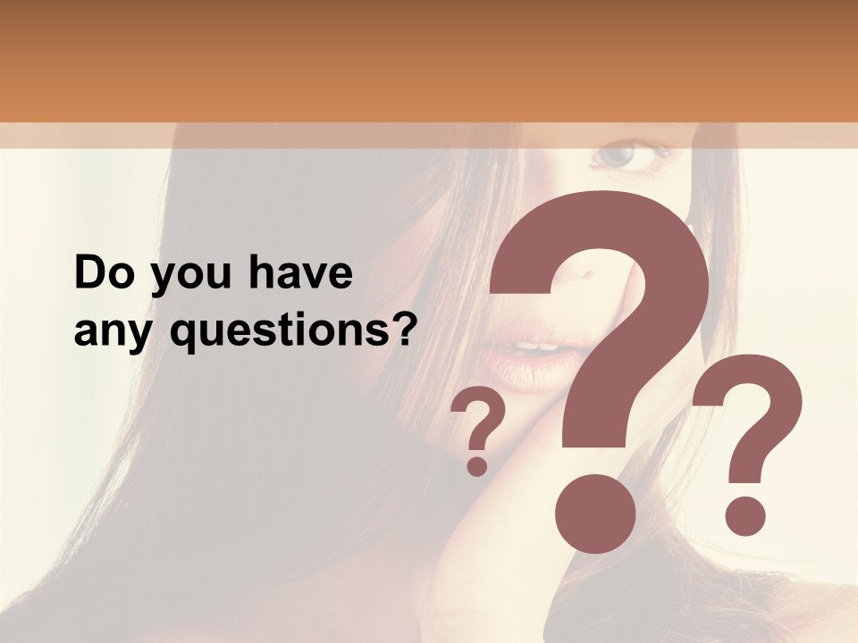 A Woman With Long Hair Is Looking At The Camera PowerPoint Template