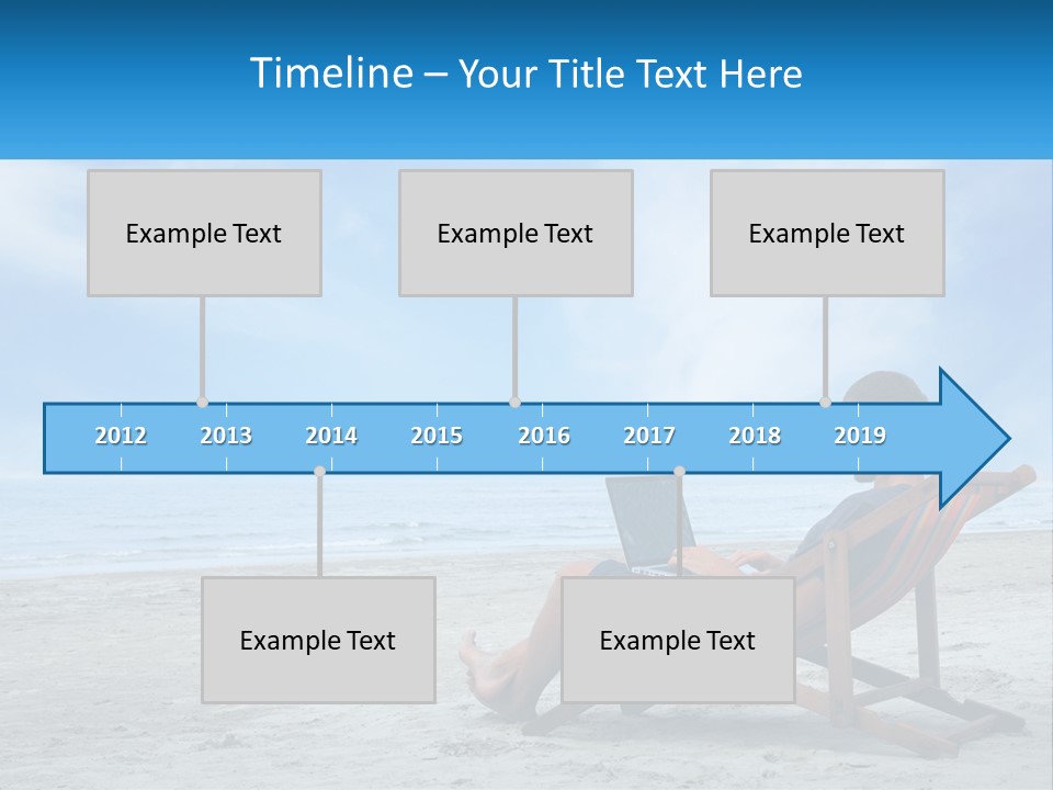A Man Sitting In A Chair On A Beach Using A Laptop PowerPoint Template