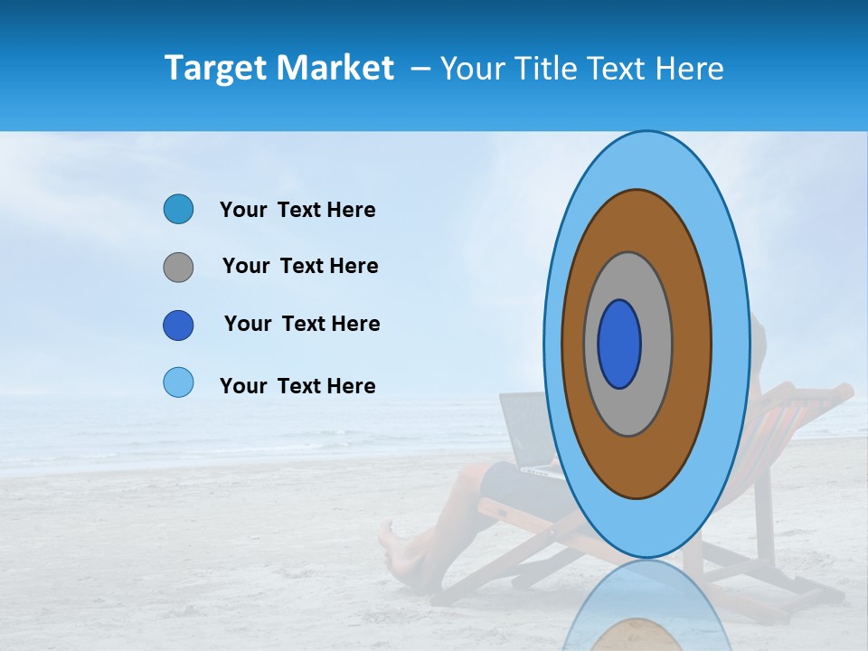 A Man Sitting In A Chair On A Beach Using A Laptop PowerPoint Template