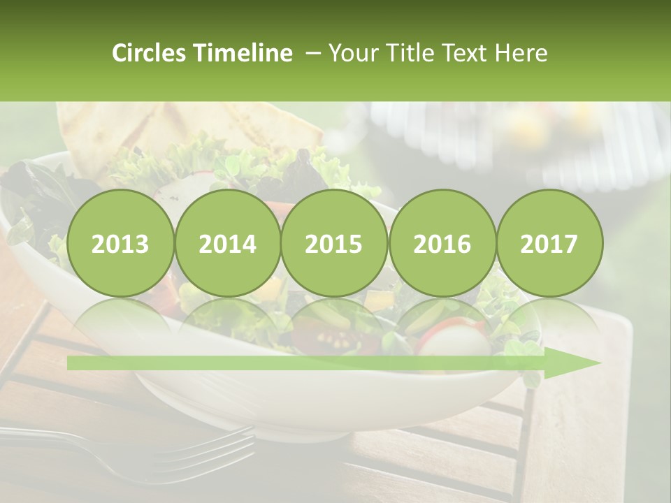 A Bowl Of Salad With Tortilla Chips On The Side PowerPoint Template