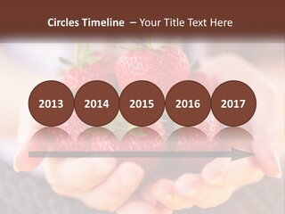 A Person Holding A Bunch Of Strawberries In Their Hands PowerPoint Template