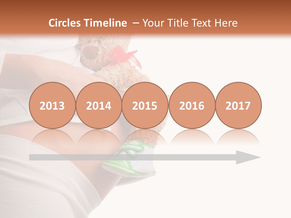 A Pregnant Woman Holding A Teddy Bear In Her Belly PowerPoint Template