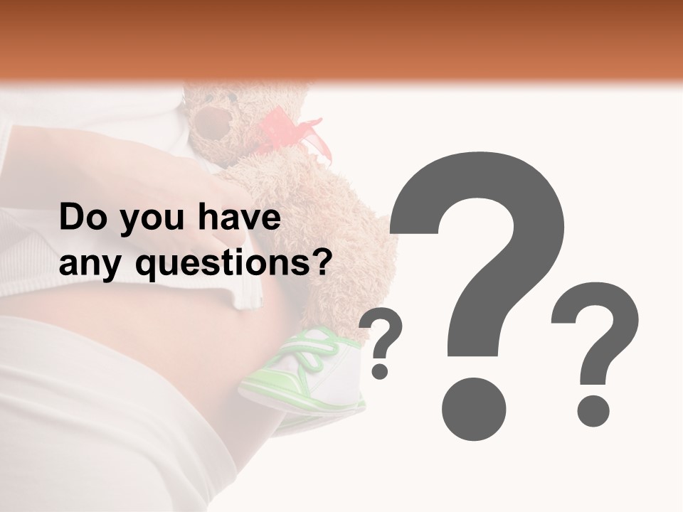 A Pregnant Woman Holding A Teddy Bear In Her Belly PowerPoint Template